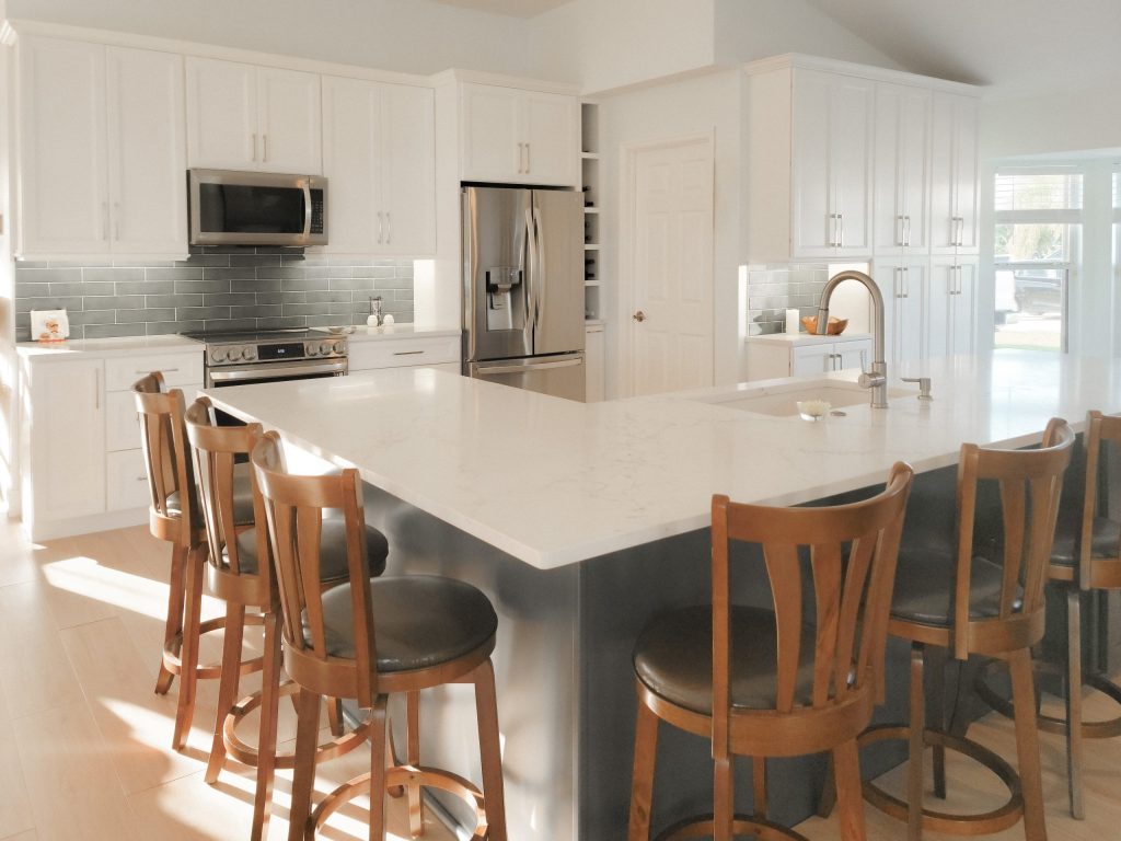 Blue-and-White-Kitchen-with-Large-Eat-In-Island-by-Carr-Cabinets-9-scaled